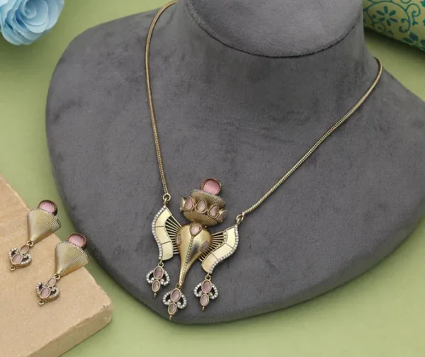 Stylish Light Pink Color Lord Ganesha American Diamond Necklace Set